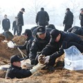 韩国对志愿军遗骸进行发掘 准备归还中国